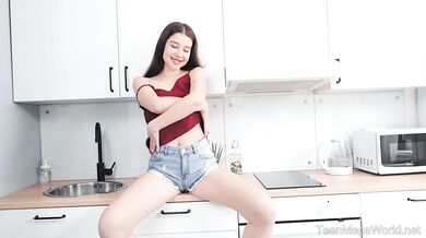 Hottie rubs pussy to orgasm