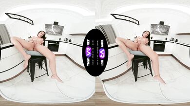 Naked cutie orgasms in the kitchen