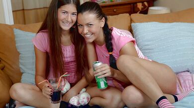 Pretty teens sharing toys