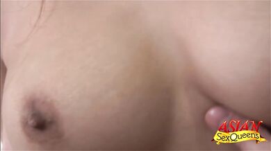 Cute Asian girl teases her boobies