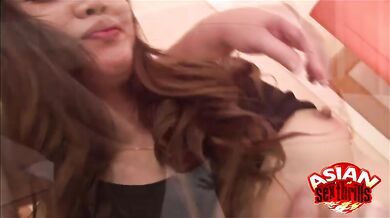 Hot Asian showing off her nipples