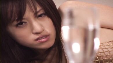 Arisa Kanno in sexy fishnet rides a big dildo