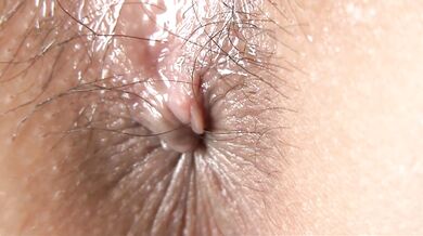 Mirai Asian babe puts vibrator on oiled clitoris