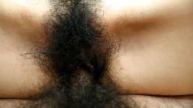 Miu Shinohara caresses her hairy pussy