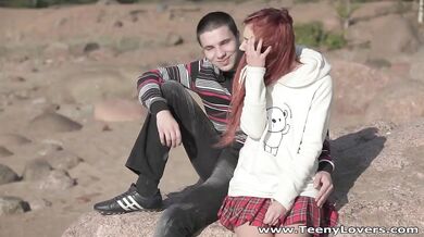 Redhead teeny fucked in a park