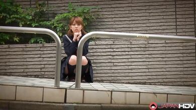 Fu Sazanami dresses in an old uniform