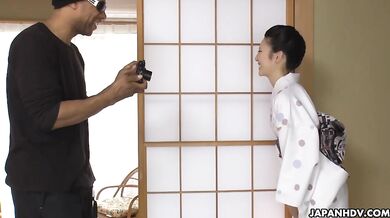 Yui Watanabe is interviewed by a black man today in her kimono