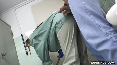 Maki Koizumi works as cleaning staff and fucks a man in a public toilet