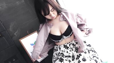 Nozomi Minami plays with our between her big tits