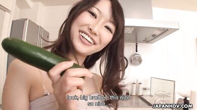 Noriko Aota shows her brother in law what she can do with a zucchini when she is horny.